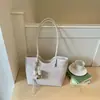 Nova bolsa tote de ombro feminina tecida em couro, de grande capacidade, cor sólida, versátil e moderna para o dia a dia