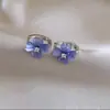 Aretes Flor de Cuatro Hojas Azul Hielo, Aretes de Alta Gama, Estrella de Cinco Puntas, Aretes Frescos y Versátiles para Mujer, Lujo Ligero