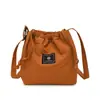 Bolsa para Mujer 2025 Estilo Coreano Simple Artística Chica Bolso de Lona Color Sólido Bolso Cubo Bolso de Hombro con Cordón Bolso de Mano Bolso Pequeño Cruzado