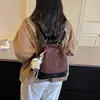 Bolso de cubo de cadena con patrón de diamantes versátil de nicho de moda retro coreana 2026 nuevo modelo bolso de hombro cruzado de alta gama