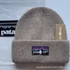 Comercio exterior al por mayor gorro de lana europeo y americano invierno protección para las orejas tejido grueso cálido a prueba de frío gorro frío bordado de letras