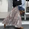 Falda plisada impresa de estilo retro francés transfronteriza de longitud media para mujer 5 Otoño e Invierno Nueva que cubre la cadera y falda grande de línea A tipo paraguas