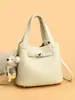 Bolso bandolera para mujer transfronterizo, bolso de hombro moderno y versátil 2026, bolso cubo informal y sencillo para el día a día, bolso de mano para el día a día