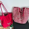 2026 Nuevo Estilo Coreano Gran Capacidad Doble Cara Rayas Estudiante Viaje Diario Bolso Tote Casual Lona Bolso de Hombro Bolsa de Compras para Mujer