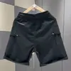Verano Nueva Marca de Moda Pantalones Cortos de Trabajo para Hombre Rasgos Atrevidos Atractivos Holgados Bolsillos Múltiples de Longitud Media Diseño con Sentido Casual Pantalones de Cinco Puntos para Hombre