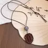 Colar Pingente Gota d'Água de Resina com Cordão de Couro Corrente de Suéter Estilo Étnico Vintage Boêmio Colar de Design Moderno para Mulheres