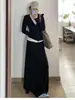 Impresionante atuendo estilo coreano: un conjunto completo de 2026 sudadera con capucha negra y falda nuevas para mujer, traje de principios de otoño