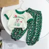 Top de manga corta, ropa infantil acanalada estilo coreano, conjunto de dos piezas 2026 para verano, combinado con pantalones modernos anti-mosquitos, nuevo estilo de seda de hielo para niñas