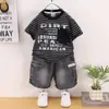 Moda para Niños Conjunto de Dos Piezas de Verano a Rayas Manga Corta 2026 Nuevo Conjunto para Niños Manga Corta Bolsillo Horizontal Cuello Redondo Moderno