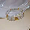 Pulseira de Rede Azul Dourada com Flor de Vidro Pérola Zircônia Brilhante Pulseira Elegante de Luxo Leve Joia de Mão Versátil da Moda