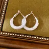Aretes de aguja plateada con circonita, aretes de aro redondos de perla geométrica, estilo elegante francés, lujo ligero y sensación de alta gama, venta al por mayor