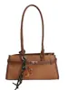 Bolsa Retro de Luxo para Mulheres 2026 Novo Estilo Coreano de Inverno Moda para o Dia a Dia Bolsa de Axila Simples Versátil Bolsa de Ombro