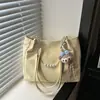 Bolso de mano de moda para mujer 2026 nuevo versátil para el trabajo cadena de perlas texturizada gran capacidad bolso de hombro informal tote