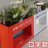 Caja de flores de acero inoxidable para exteriores combinación soporte de flores de hierro departamento de ventas valla de plantación verde partición canaleta para flores cama de flores exterior de restaurante