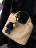 Moda Retrô Outono 2025 Nova Bolsa de Ombro Feminina Estilo Coreano Casual Bordado com Linha Bolsa de Mão Pequena Fragrância Bolsa Fosca