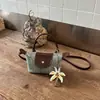Bolso tejido de moda de verano transfronterizo 2026 nuevo bolso de mano casual para mujer, bolso de hombro y bandolera versátil, moderno y único
