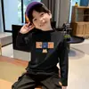 Camiseta Térmica Versátil para Niños Manga Larga para Hombre 2026 Nuevo Otoño/Invierno Ropa Interior Cálida De Rong Cepillado Cuello Medio Alto