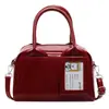 Bolso Boston portátil retro de estilo coreano para mujer, bolso cruzado de hombro combinable, moderno y de estilo nicho, para principios de primavera de 2025.