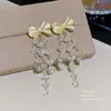 Pendientes de perla modernos y dulces, de lujo ligero con un toque de alta gama, pendientes de botón simples y exquisitos con pasadores de plata 925, pendientes de moda y con estilo para mujer