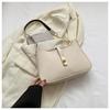 Bolsos Pequeños de Diseño de Nicho de Moda para Mujer de Este Año Nuevo Estilo 2025 Bolso Cruzado de Color Sólido de Moda Bolso de Hombro a la Moda Bolso de Axila
