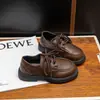 Zapatos de piel para niño modelo nuevo 2026, zapatos negros para niña de suela blanda, zapatos de vestir sencillos versátiles estilo británico, estilo escolar