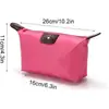 Bolsa de mão moderna em cores de doce, necessaire portátil em formato de bolinho, organizador de skincare e maquiagem para viagem