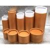 Latas de Té Botella de Aceite Esencial Tubo de Papel Tarro de Papel Kraft Tarro Cilíndrico Embalaje Exterior Sellado Té Negro Casa de Té Ambiente de Hotel