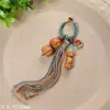 Colgante de Sándalo Natural con Forma de Caqui para la Suerte Colgante para Llavero de Coche Colgante Decorativo para Bolso Pieza Pequeña de Artesanía de Madera
