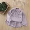 Conjunto de Falda Suéter para Niña 2025 Otoño Nuevo Tejido a Mano con Flores de Dos Piezas Traje Dulce de Suéter para Niña Pequeña