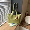Bolso tote calado minimalista estilo coreano transfronterizo 2026 nuevo modelo bolso de hombro de lujo ligero para commuting para mujer bolso de gran capacidad para debajo del brazo