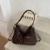 Bolso de Felpa Gamuza Maillard de Nicho para Mujer 2026 Nuevo Otoño Mochila Multifuncional para Viajes Cotidianos Bolso de Hombro Único Cruzado