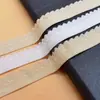 Ropa interior personalizada de fábrica de 19 mm con capullos de flor, dobladillo plegado, dobladillo en las perneras del pantalón, dobladillo en la cintura del pantalón, dobladillo con dobladillo decorativo