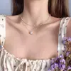 Joyería Transfronteriza Europea y Americana, Elegantes Accesorios de Cadena de Perlas para Mujer, Collar de Corazón Calado Geométrico de Doble Capa de Perlas