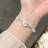 Pulseira Fivela da Paz Xiao Que Xing, Estilo Chinês Cool e Elegante para Meninas, Pulseira Popular de Alta Qualidade 2026, Presente para Namorada