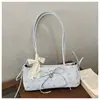 Bolsas Estampadas de Nicho Primavera e Verão para Mulheres 2026 Novo Estilo Versátil Bolsa de Ombro/Axila para o Dia a Dia Bolsa de Mão Fashion Bolsa Baguete