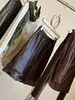 Moda falda midi de cuero PU de doble capa con volantes, cintura elástica, para mujer, nuevo estilo de otoño, juvenil y elegante, diseño ajustado al cuerpo