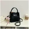 Bolso Cubo de Mano de Nicho Estilo Coreano para Mujer 2026 Primavera Nuevo Moda Bolso de Hombro Único Bolso Cruzado Simple de Alto Valor