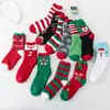 Calcetines de Navidad de medio terciopelo para otoño e invierno, tipo flor, suministro directo de fábrica, calcetines cálidos para el suelo de casa de Papá Noel, calcetines para dormir