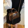 As bolsas pequenas populares deste ano para mulheres, versáteis para outono e inverno 2026, nova moda retrô, bolsa de ombro único, bolsa transversal, bolsa de mão, bolsa almofada