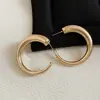 Pendientes Redondos Metálicos Brillantes de Aguja Plateada Pendientes Exagerados de Moda Transfronterizos Europeos y Americanos con un Diseño Único para Mujeres