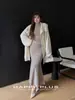 Conjunto de Estilo Coreano para Hermanas Tallas Grandes para Mujer Runqi 9508: Elegante y Maduro Bodycon Falda de Cola de Pez con Diseño de Patchwork