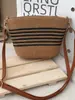 Uma geração de bolsa de ombro feminina de cabelo, bolsa tecida de corda de algodão listrada, bolsa diagonal tecida simples moderna, bolsa de praia atacado