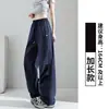 Calça de trabalho feminina azul marinho, fina para primavera e outono, novo estilo 2026, versão solta afunilada, casual de secagem rápida, calça pantalona bordada para baixinhas