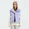 Nuevo chaleco cálido de invierno coreano para hombres y mujeres, chaleco de moda con cremallera y botones a presión, chaleco acolchado sin mangas para hombres
