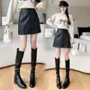 Falda corta para mujer, falda-pantalón de cuero para otoño e invierno, shorts falda sexy de chica caliente de cintura alta, shorts de cuero, falda de longitud media para mujer