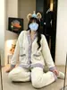 Pijama de Coral Fleece para Mujer Otoño Invierno Nuevo Estilo Set Portátil con Cremallera Moda Suelto Engrosado Cálido Cárdigan Ropa de Casa