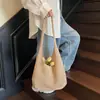 Bolso tejido hueco estilo coreano para mujer, nuevo bolso de mano informal de verano 2026 para vacaciones y viajes, bolso de hombro de gran capacidad