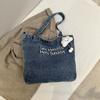 Bolso de lona vaquera estilo americano vintage para mujer, bolso de hombro de gran capacidad, bolso informal para estudiantes, bolso de mano combinable.