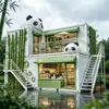 Cafetería con contenedor temático de bosque de bambú de panda de dos pisos con terraza de doble escalera, un popular restaurante de estilo chino en la zona escénica