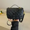 Bolsa de mão de alta qualidade transfronteiriça estilo Chanel para mulheres, nova moda coreana 2026 com laço, pequena bolsa quadrada de ombro e transversal